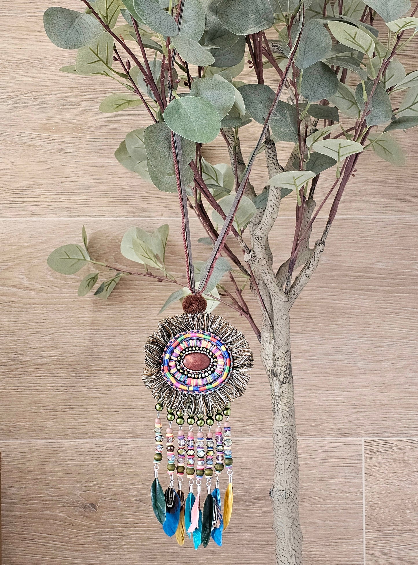 Bohemian feather and bead necklace with leather cord