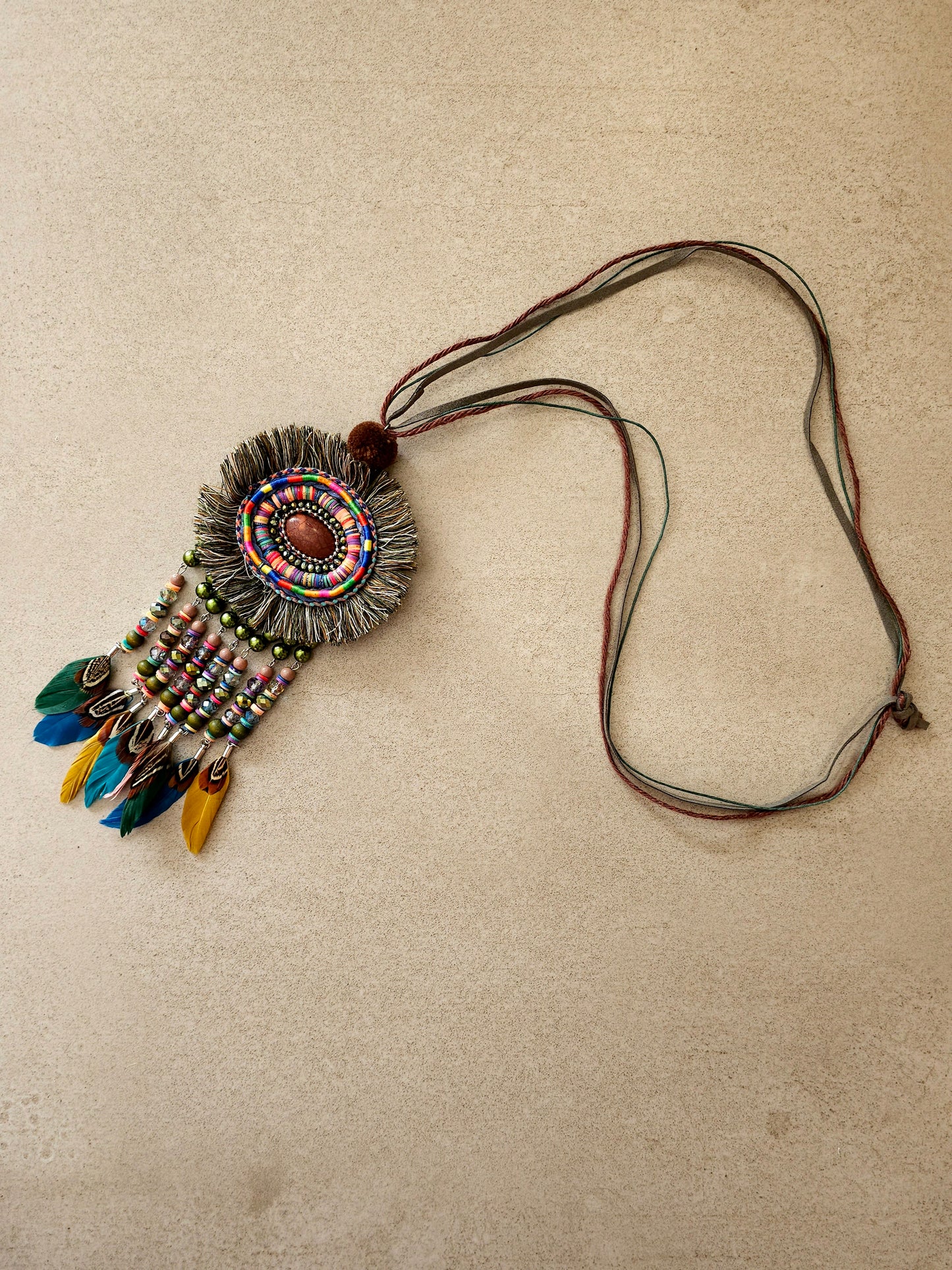 Bohemian feather and bead necklace with leather cord