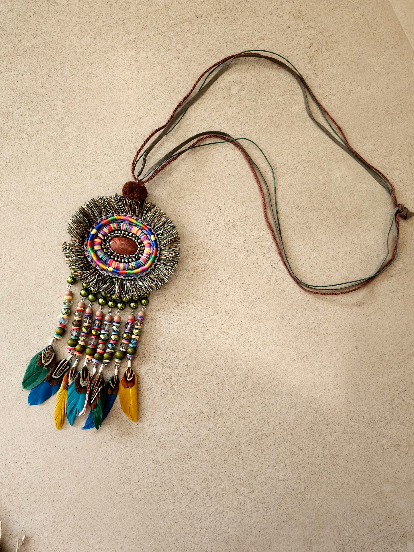 Bohemian feather and bead necklace with leather cord