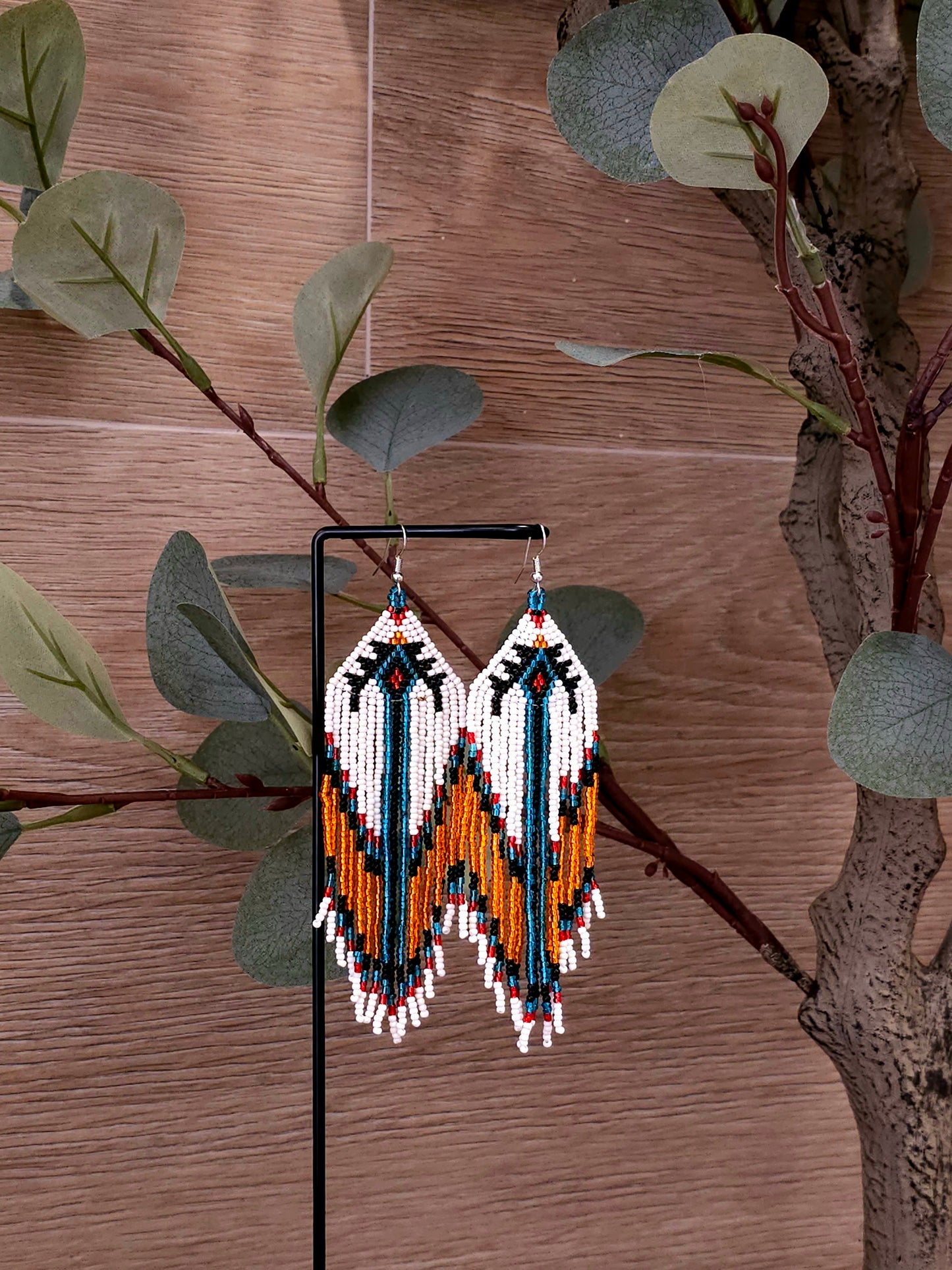 Ember Cascade Earrings with Tribal Pattern and Fringe Design