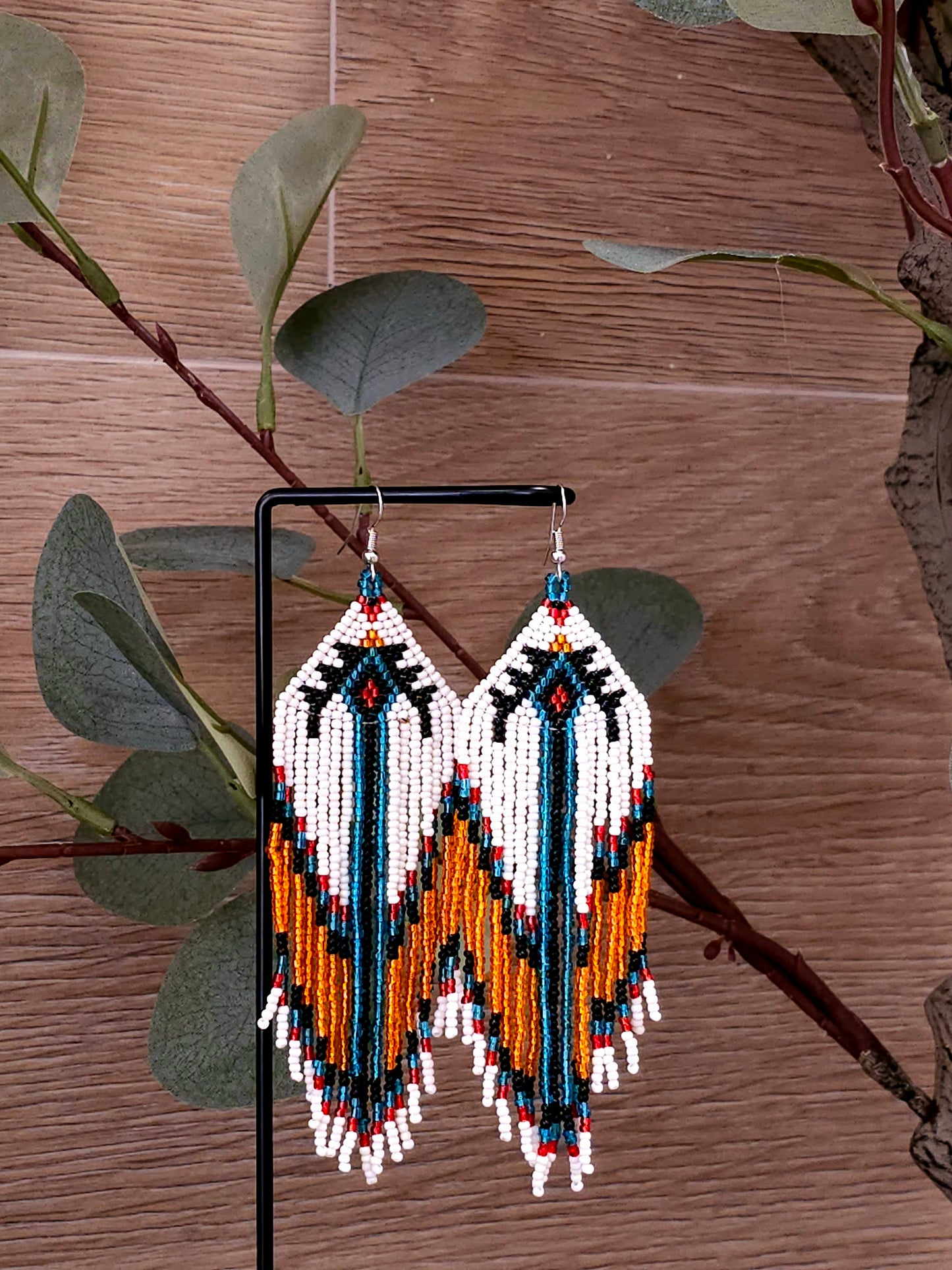 Ember Cascade Earrings with Tribal Pattern and Fringe Design