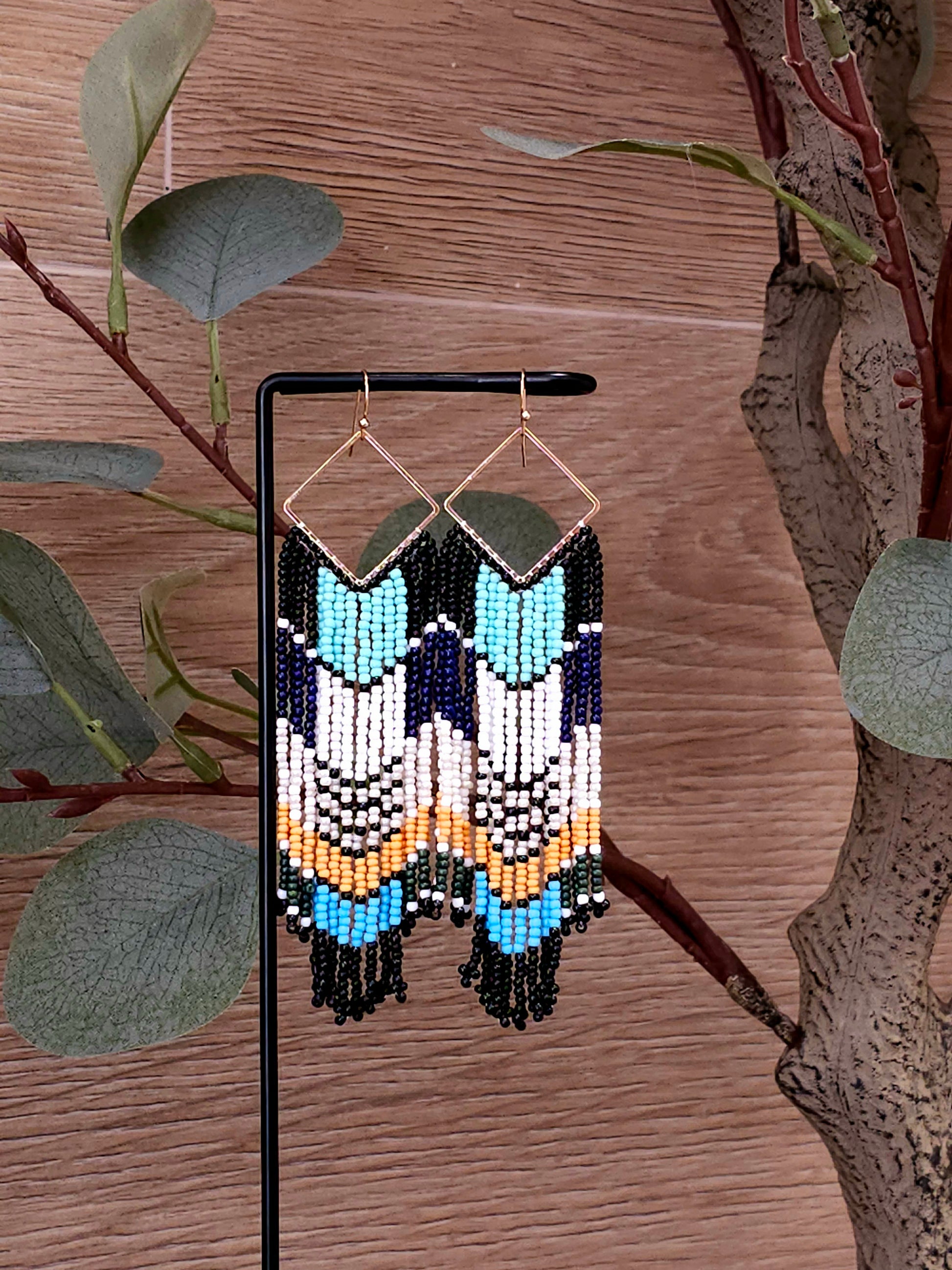 Tribal Harmony Earrings with Colorful Beads and Gold Outline