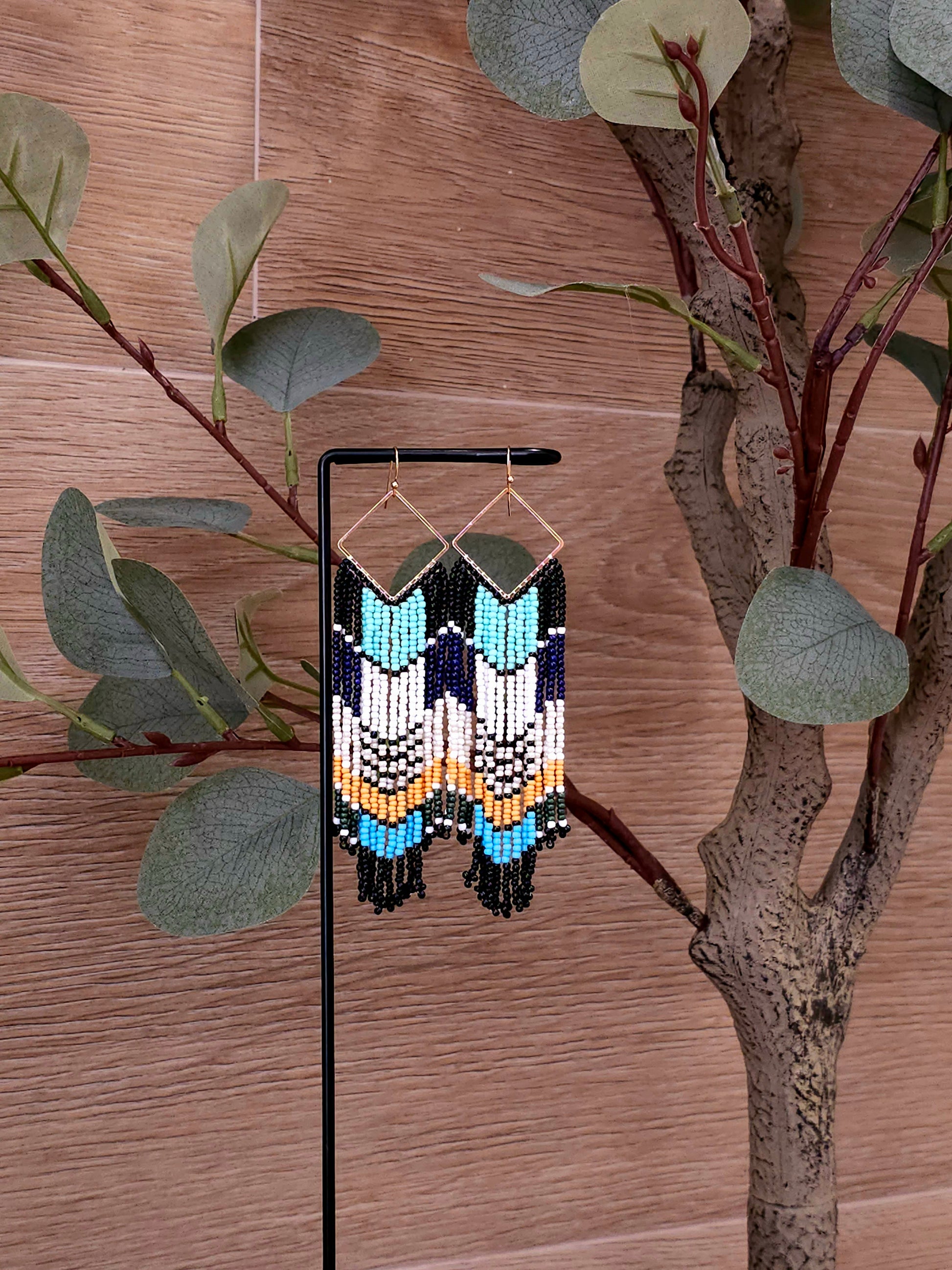 Tribal Harmony Earrings with Colorful Beads and Gold Outline