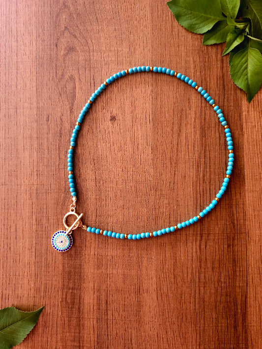 Turquoise Charm Necklace with Beads and Circular Pendant
