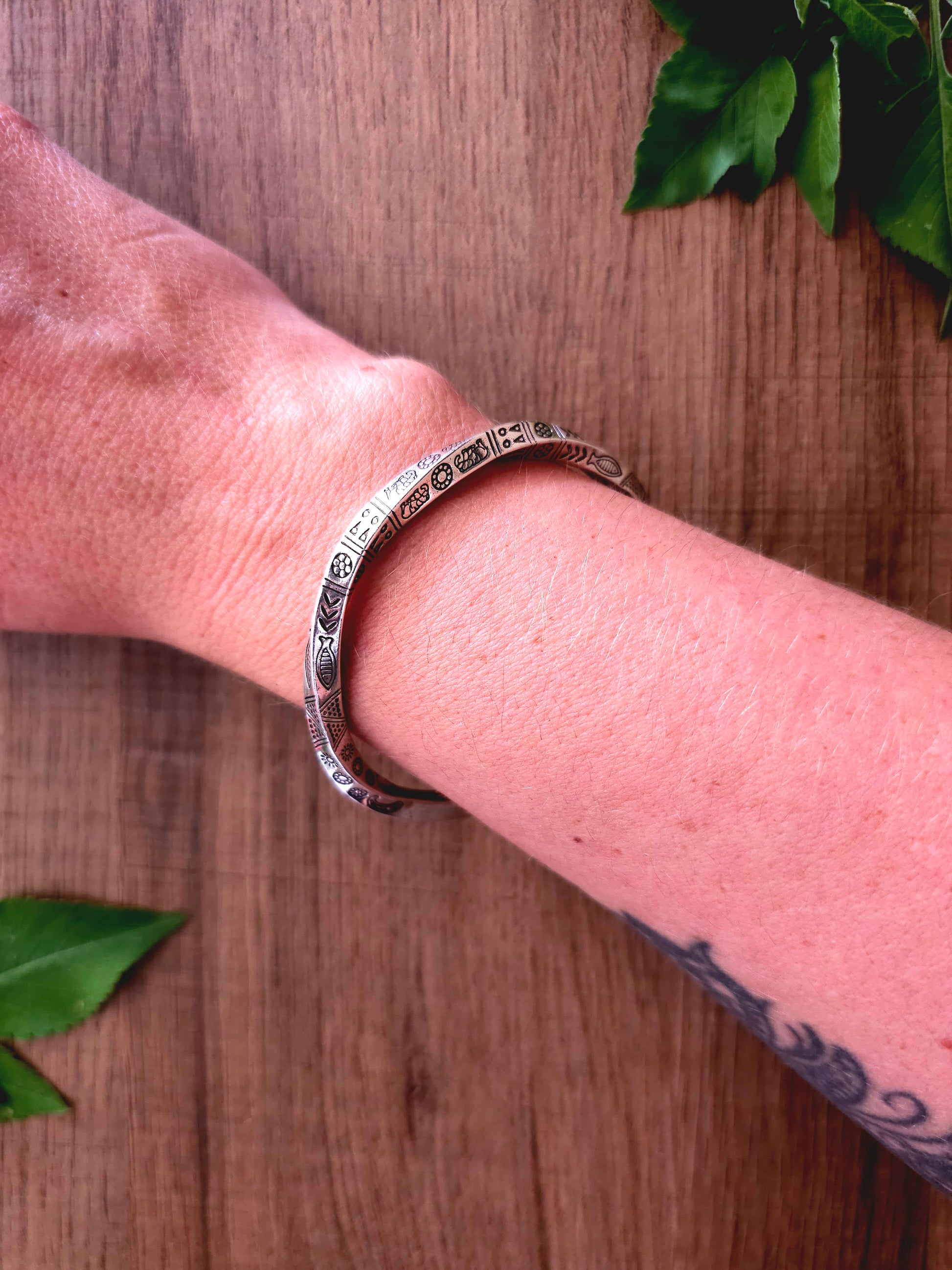 Tribal Heritage Cuff Bracelet with Intricate Tribal Patterns