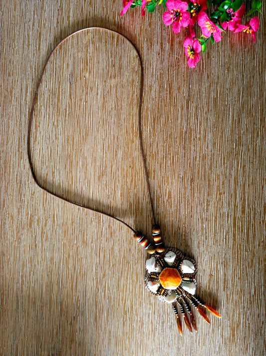 Boho amber pendant necklace with floral design and earthy beads