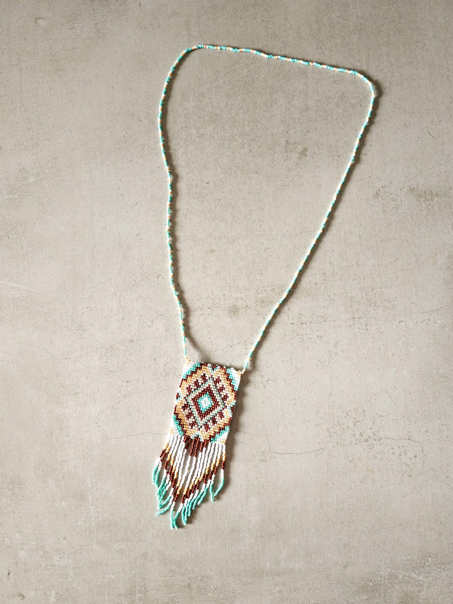 Desert Dawn Necklace with Earthy Beadwork and Fringe Details