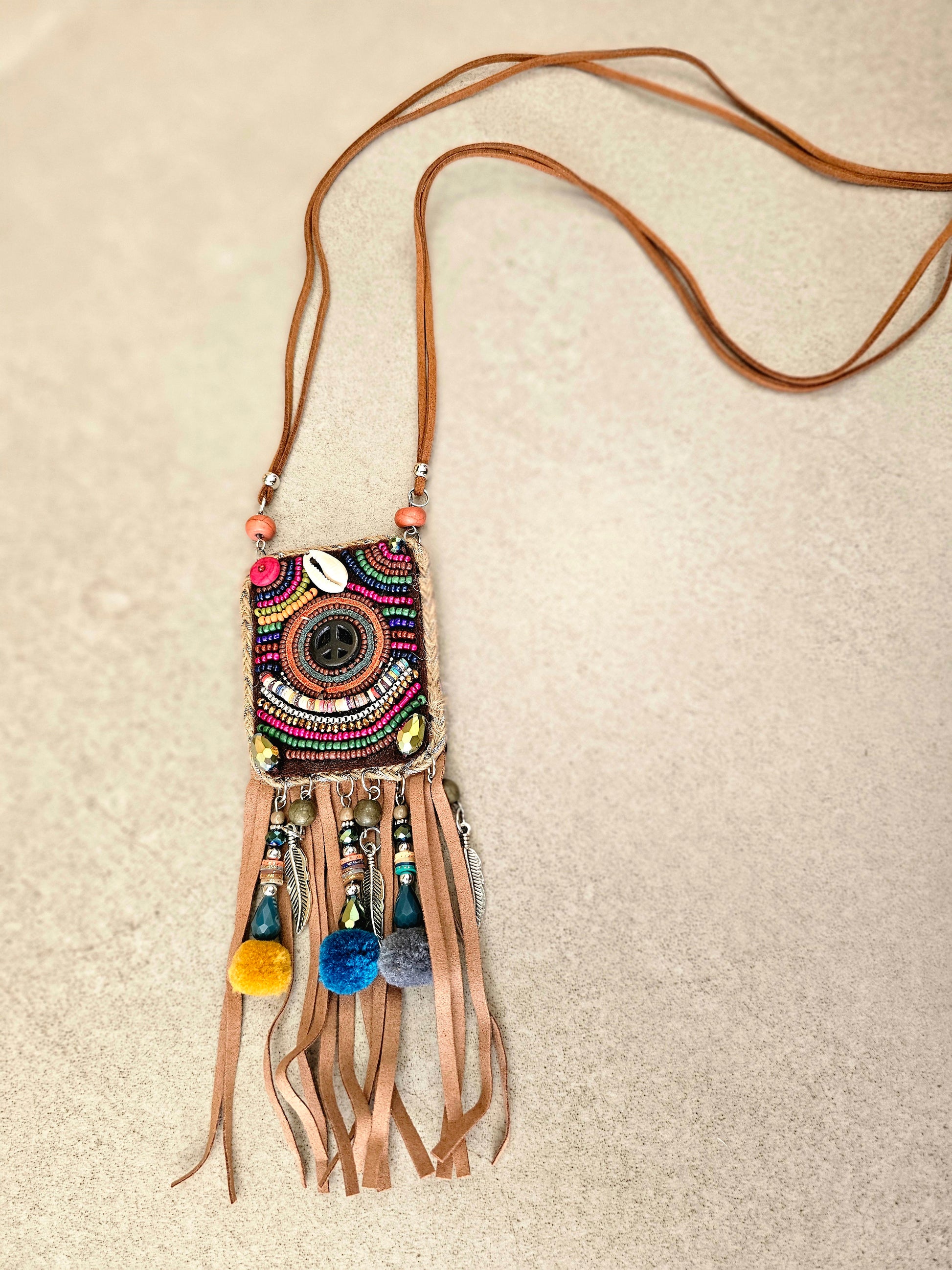 Bohemian necklace with fringe and peace symbol