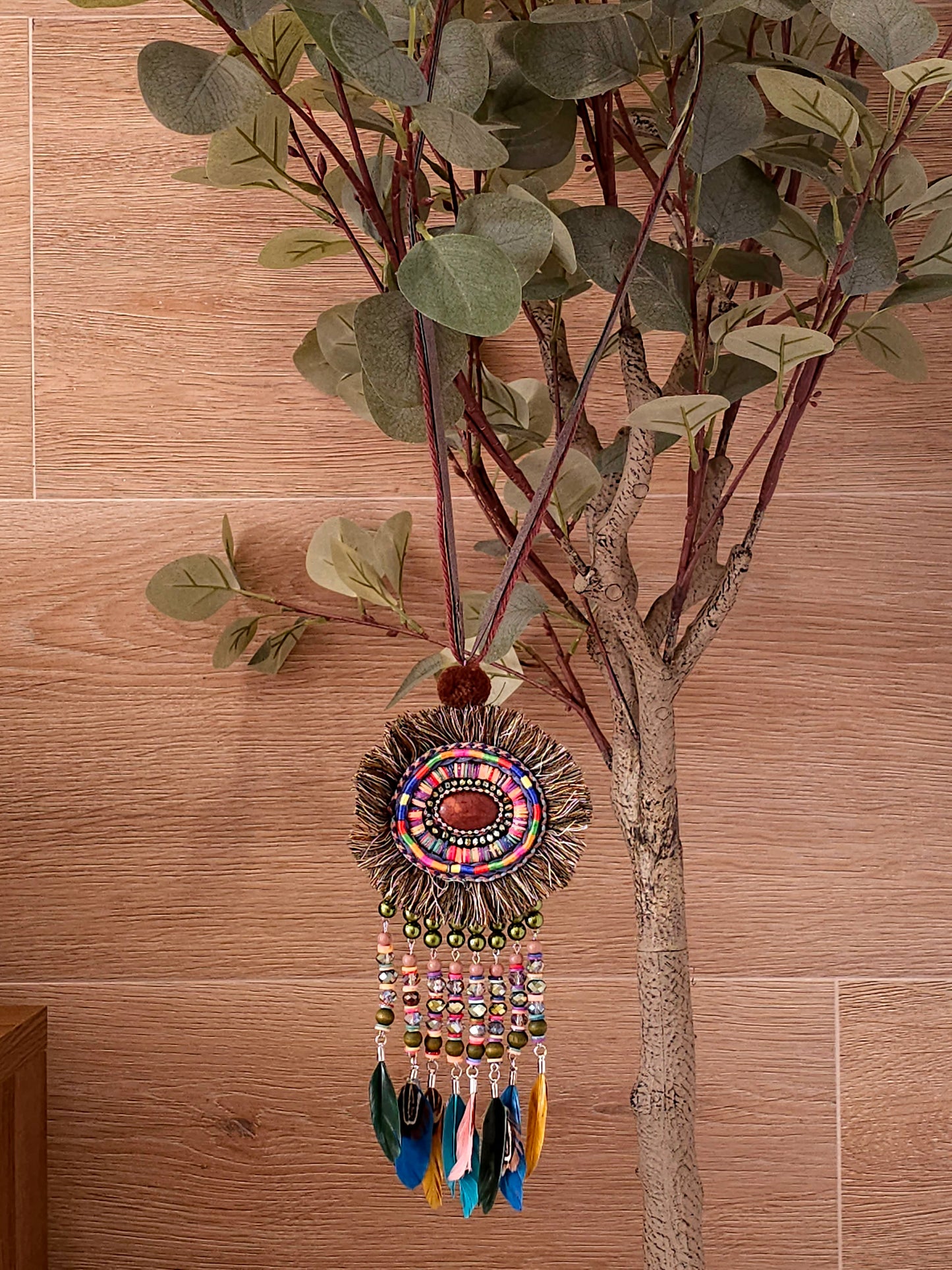 Bohemian feather and bead necklace with leather cord