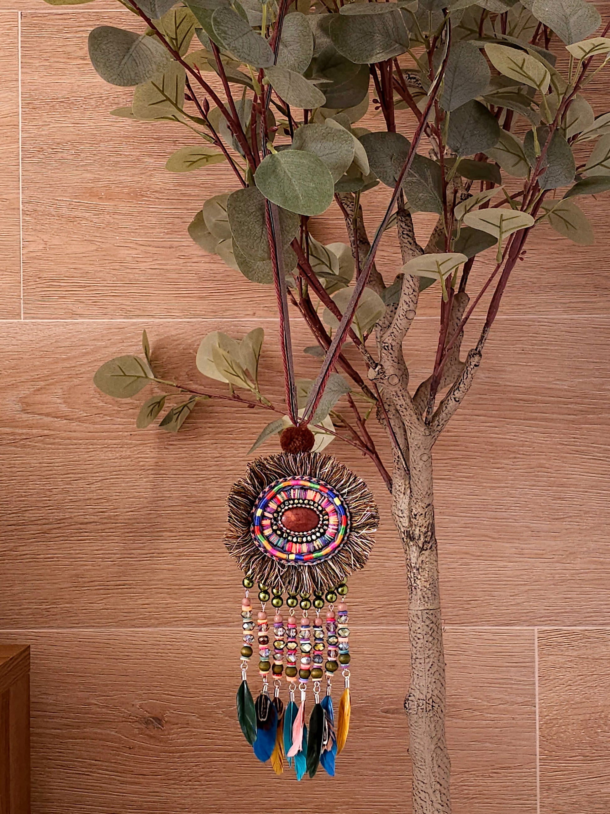 Bohemian feather and bead necklace with leather cord