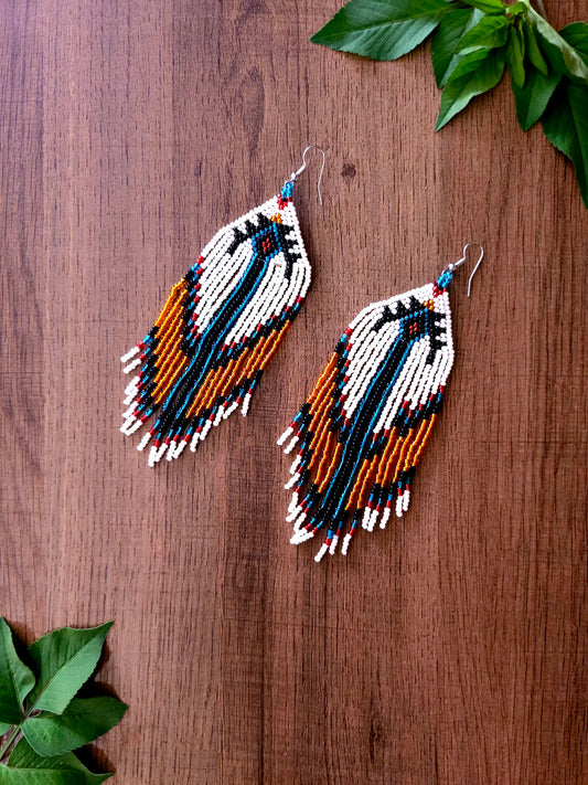 Ember Cascade Earrings with Tribal Pattern and Fringe Design