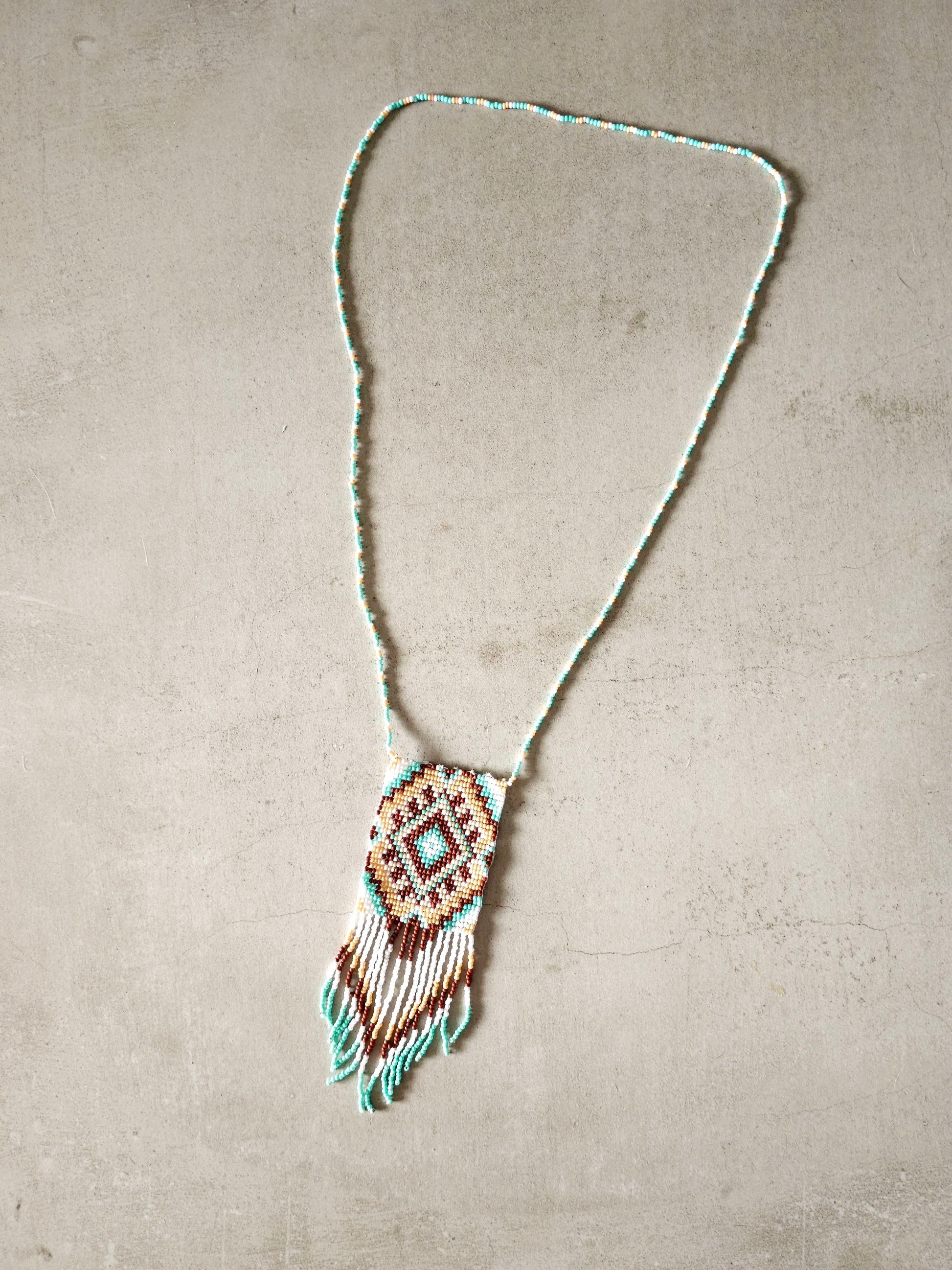 Desert Dawn Necklace with Earthy Beadwork and Fringe Details